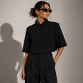 ELYN, women's black cropped jacket with structured stand collar