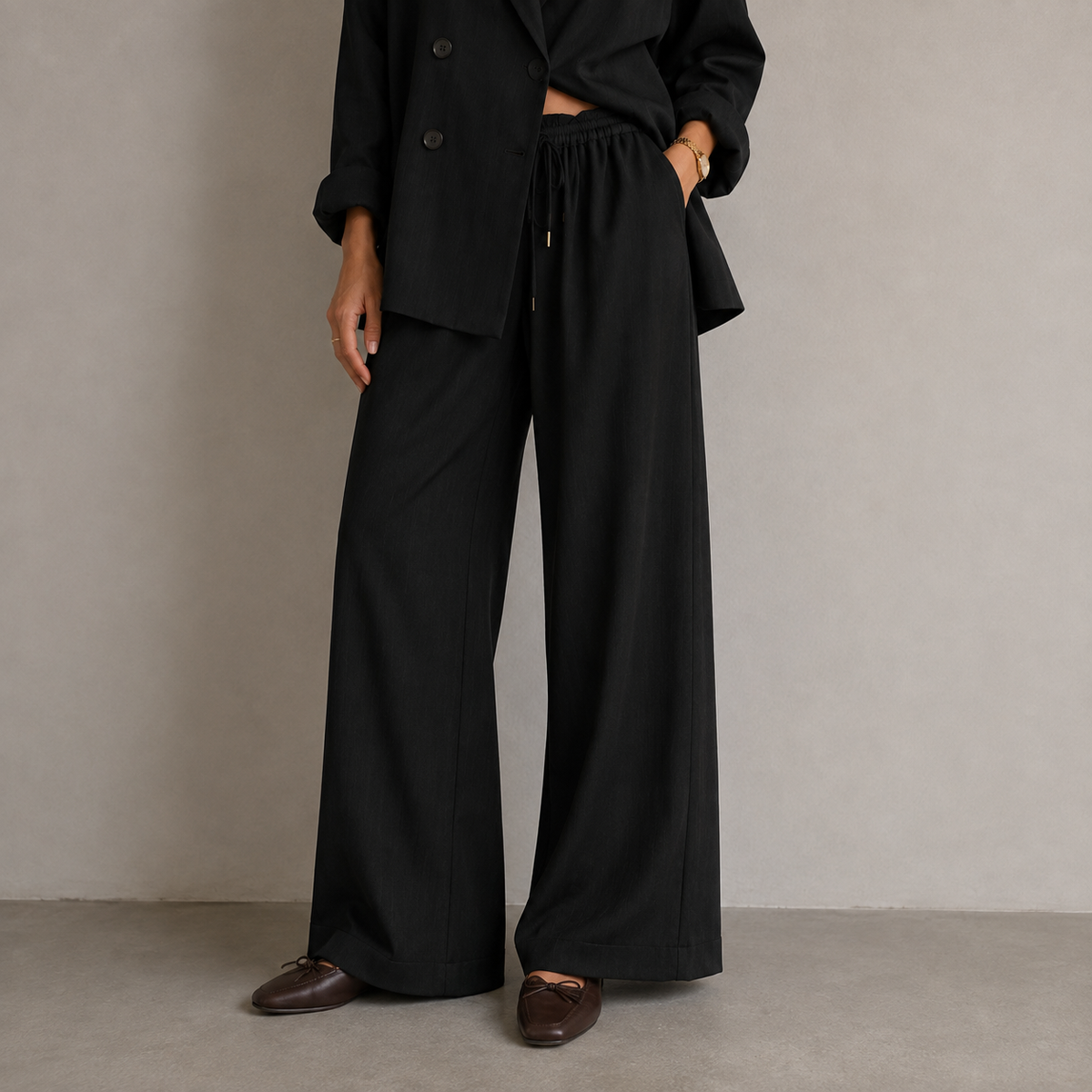NOA blazer and trouser set, detail of double-breasted closure